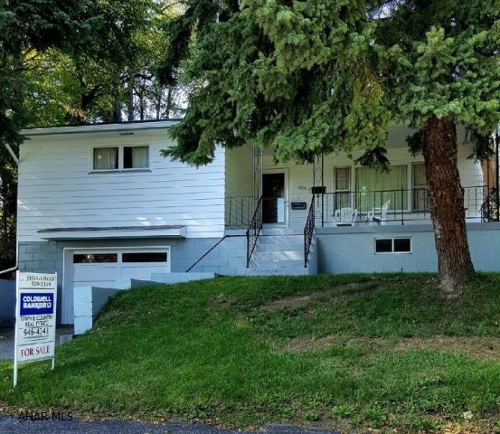 Location, location, location!  This immaculate and solid one story home has the original beautiful hardwood flooring throughout!  It has 3 spacious bedrooms..All of them have nice size closets with a double closet in the master.  It also offers a very large eat-in kitchen with the original solid birch cabinets.  A full basement that was used as an extra family room.  The integral garage may say only 1 stall but it is deep enough to park 2 cars end to end.   There is also a huge workshop out back along with a closed in rear porch. This home has a semi-private setting..with many updates.  Comparable homes in the neighborhood have just sold for tens of thousands more.  It is priced low enough to add your own personal touches and updates without being overspent.  Great Value!!!!