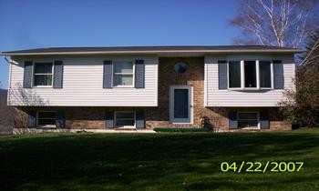 Great 5 bedroom 3 bath bi-level with new carpet, bar and laundry room with coal pellet stove, large new deck, on 1+acres. SR High School: Hollidaysburg Area. Large maintenance free deck. Large 18 gauge steel shed. Close to State Game Lands & State Park.  Coal stoker fireplace.