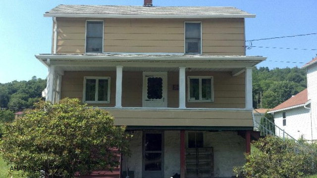A Must see! Price right- move-in condition 2 BR, 1 1/4 bath with 1 car detached garage. Corner lot.