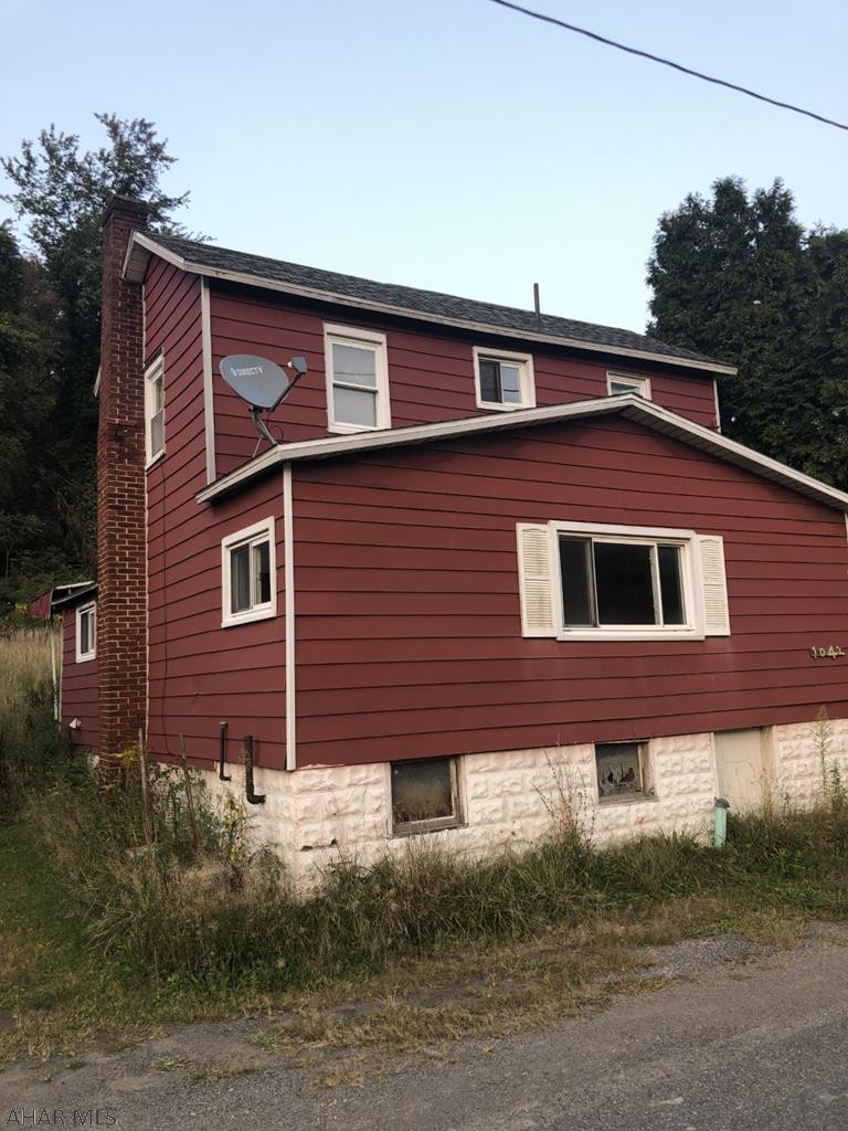 Elmora- 2 story aluminum sided 3 BR home on a 50 x 116 lot. Oil FA heat. Lots of potential! Priced to sell