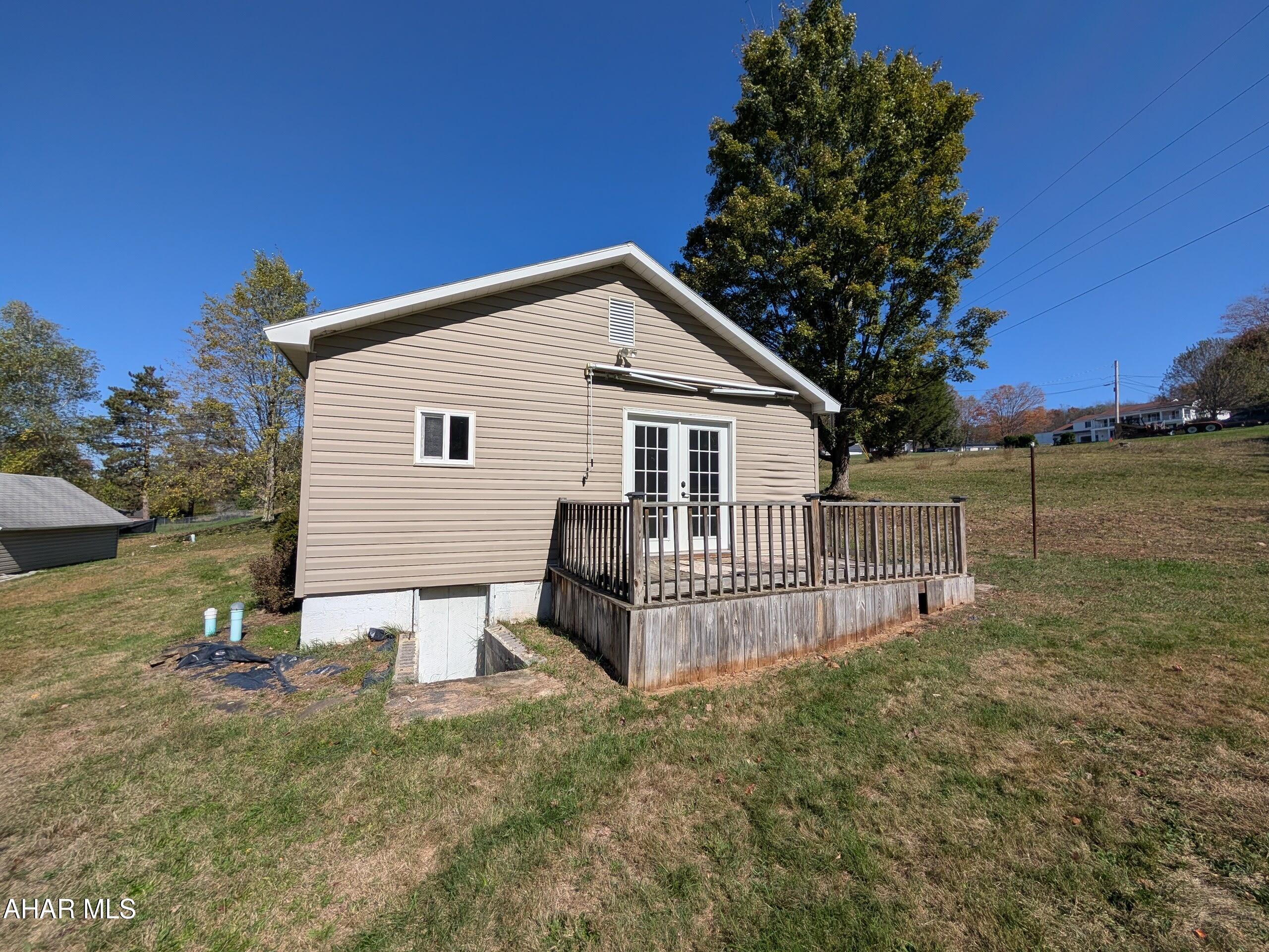 Houtzdale 1 story vinyl charmer with one floor living! Modern, updated kitchen with stainless teel appliances, first floor laundry, large living room, 2 bedrooms and updated bath with jet tub. Enclosed front porch, rear deck, nice lot and large storage shed.  AS-IS sale. Seller will make no repairs