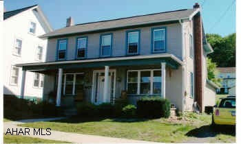 Well maintained 3BR/1.5BA vinyl 2-story with covered porches and central air.