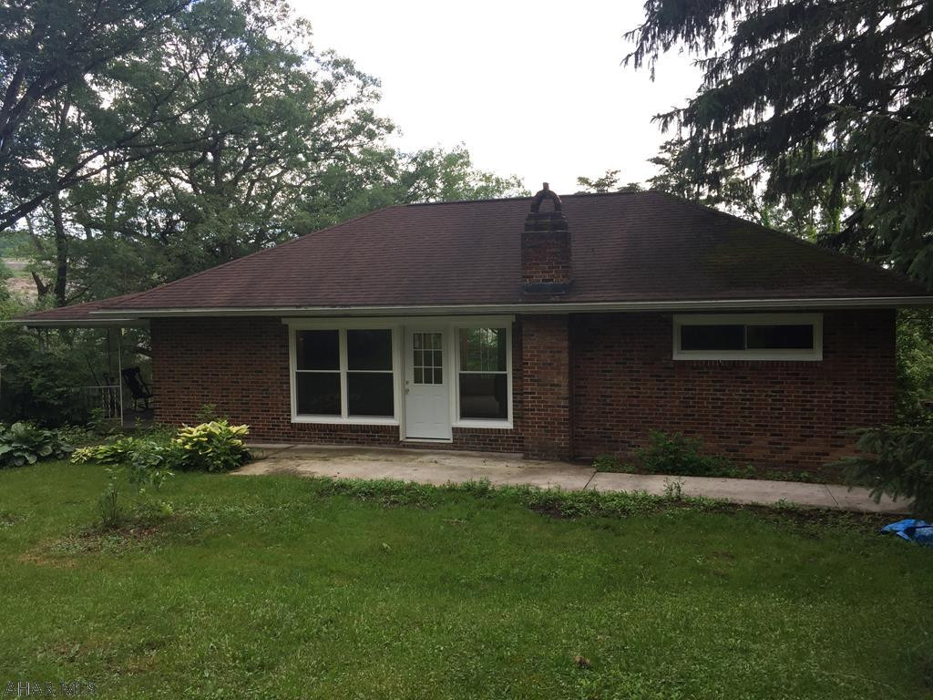 Brick ranch home recently updated with 200 amp service, 3-heat sources, electric, propane and pellet stove and newer well pump. This home offers 2-bedroom, 1-full bath, newer carpeting and laminate flooring, all replacement windows, fresh paint throughout and full basement with 1-car integral garage.