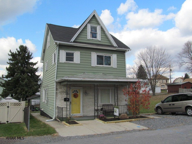 Great starter home in a convenient location, close to everything and on 5 city lots!  This 2BR, 2.5 bath has HW floors, updated kitchen and bath, first floor laundry & central air.  Large windows on 1st floor allow an abundance of natural light. Lower level has been partially finished into a playroom. Large closets for plenty of storage.
