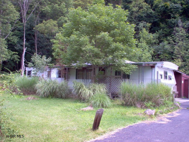 Trailer is in extremely distressed condition. nice, large detached 2 car garage, .73 acre lot.
