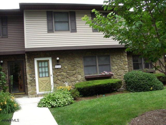 Immaculate townhouse in Highland Park.  Stone woodburning fireplace in living room, heated sunroom, new carpet in FR, beautiful oak staircase, eat-in kitchen with all appliances, formal DR with newer wood laminate flooring.  Radon system in place.  One car integral garage.