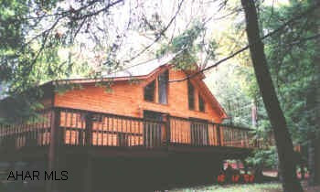 EXTRAORDINARY SPECTACULAR. 2 BR, 2 BA. MASTER W/WHIRLPOOL. HEATPUMP WITH CA. CERAMIC, BERBER, RECESSED LIGHTING. DECORATIVE TILE THROUGHOUT. GAS FIREPLACE, WRAP AROUND DECK. SKYLIGHTS. FRENCH DOORS. 1.5 MILES FROM GATE. PRICED TO SELL. YEAROUND AMENITIES INCLUDE POOL, TENNIS, BOATING, FISHING.