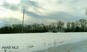 11 acres with an old single wide trailer (1972) on property. 11 acres with an old single wide trailer (1972) in property. Great views, newly surveyed, 7 acres wooded, 4 acres cleared.