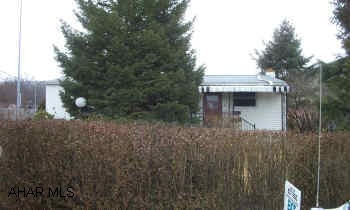 Immaculate rancher in Mansion Park area. Updated bath and kitchen. New windows and roof. Nice hardwood flooring . Zoned Residential/Commercial. Retail permitted. Located behind Atty. Golstein's Logan Blvd. office. Great location! See agent for a complete list of acceptable businesses for this location and zoning.