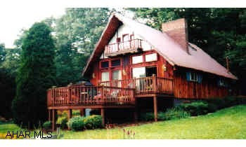 Cozy chalet on .91 acre lot with 2 sheds, 16x28 workshop, 2 fireplaces, cedar siding, family room could be 3rd bedroom. Only 2 miles to Blue Knob Ski Resort and State Park. DIRECTIONS: Blinking light in E. Freedom turn R to Blue Knob at 4 way intersection Cozy chalet on .91 acre lot with 2 sheds, 16x28 workshop, 2 fireplaces, cedar siding, family room could be 3rd bedroom. Only 2 miles to Blue Knob Ski Resort and State Park. DIRECTIONS: Blinking light in E. Freedom turn R to Blue Knob at 4 way intersection turn L - go 3.4 miles turn R on Lane.  Vaulted ceilings.
