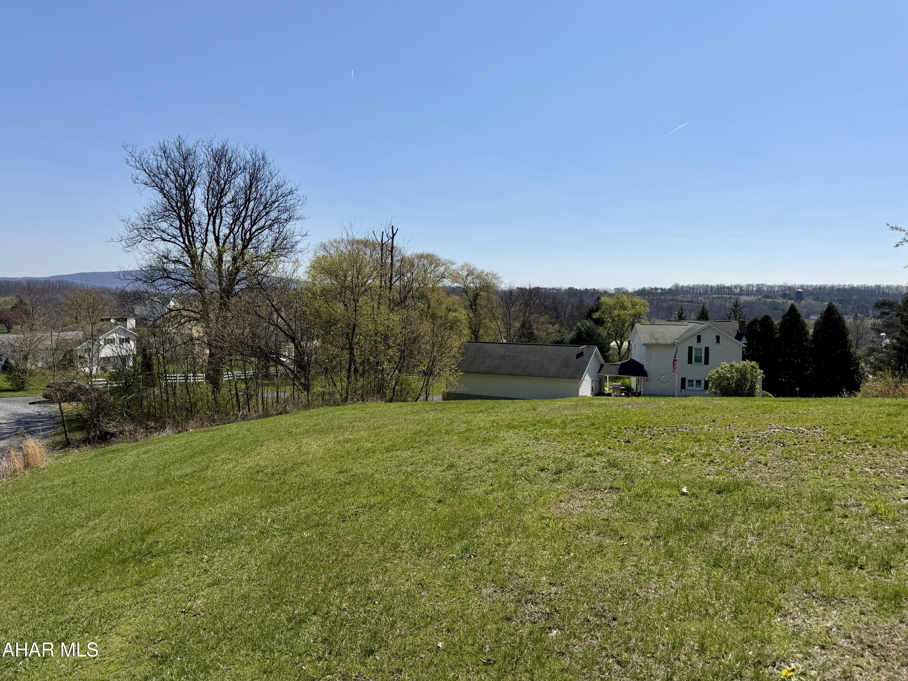 Desirable building lot with a view! Public water and sewer are available at the property line, making it a convenient lot to build your dream home on.