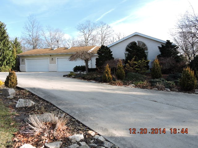 Spacious floor plan w/great room & double sided fireplace in kitchen.  Large master suite includes dressing area & big bath. Fully finished basement with 2nd half bath, kitchenette, & wet bar.  Well landscaped lot with in-ground pool.  House needs updated. AS IS SALE. Not a part of Sylvan East Development. Employees of Bank of America or its affiliates or subsidiaries are strictly prohibited from directly or indirectly purchasing any property owned by Bank of America.
