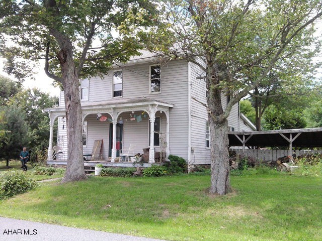 2 story, 4 bedroom home on 5.33 acres in Warriors Mark. Seperate 2 bedroom cottage and 40' x 60' pole building.  No showings until after September 1.