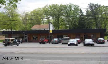 INVESTMENT OPPORTUNITY.  LOGAN TWP./GREENWOOD.  OVER ONE ACRE OF GROUND CONTAINING 4 BUSINESS RENTALS AND 2 RESIDENTIAL RENTALS.  CURRENTLY GROSSING $30,720.
