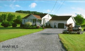 CHARMING CAPE ON 9/10 ACRE, BEAUTIFULLY LANDSCAPED AND VERY SCENIC. OAK KITCHEN. 1ST FLOOR MASTER BEDROOM