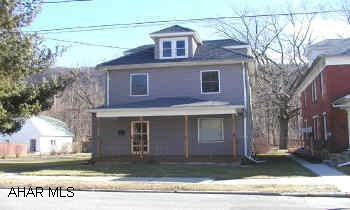 Remodeled 2 1/2 story home with new roof.  Large modern oak kitchen. Wrap around deck. 2 car detached garage, separate carport.  Remodeled 2 1/2 story home with new roof.  Large modern oak kitchen. Wrap around deck. 2 car detached garage, separate carport.