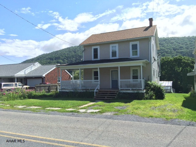 Charming farmhouse style with wrap around porch.  3 bed with updated baths, new roof, updated mechanicals, vinyl sided, freshly painted.