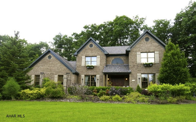 Magnificent home with all conveniences. Roof-Oct 2010, kitchen, laundry, furnace/heat pump/humidifier/air cleaner/air conditioning-2009. Master bath renewed since 2009. Brand new water filtration system-2013. Finished basement has a private entry too and has 1/2 bath which could be expanded to full. 2 new heating units in the finished basement. Beautifully decorated. Grand double door entry. Superb gardens. A must see! Asking price based on recent appraisal.
