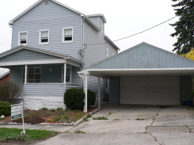 This house located in a very nice area of East End and is very roomy. There are large rooms and over sized closets, a partially finished basement with a 3/4 bath. The fenced in back yard is great for pets or play, lg deck to the back yard is great for picnic's and cookouts. There is a huge 2 car garage and a work bench area in the front. The 2 car carport over the drive way that is attached to the garage saves shoveling in the winter. Never be hot in the summer there is Central Air for cooling.