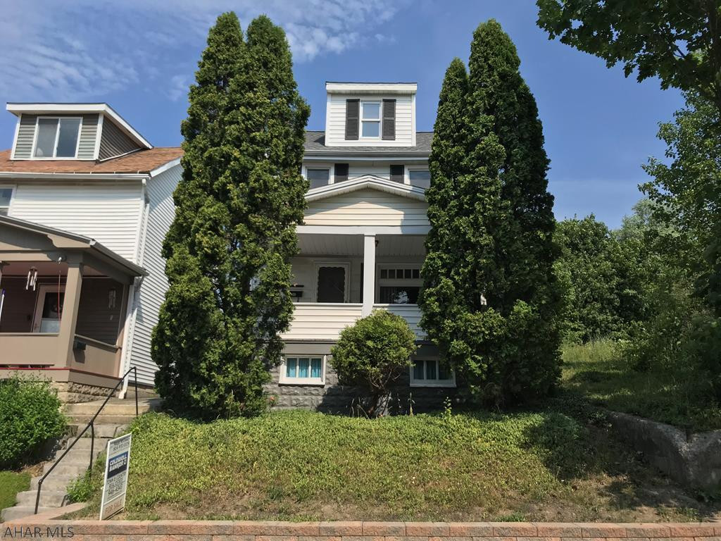 Spacious family home with first floor laundry room, large kitchen with appliances and lots of cabinets, replacement windows, new GFA Carrier furnace in 2017, new shingle roof in 2018, patio in rear with new retaining wall, new cement sidewalk in front.  Third floor is finished for 4th bedroom.  New carpet in living room and dining room.  Move in and put your personal touches on this great family home.