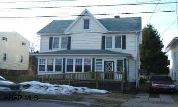 Roof, addition, a/c, windows, furnace all since 1999.  2 car det. garage, central air, finished 3rd floor. Addition on back has 1st fl laundry, bedroom, 3/4 bath, radiant heat and cemented crawlspace. Large remodeled 2 1/2 story home with central air, 2 car det. garage, 2 drives.  Hardwood under 1st fl. carpets.