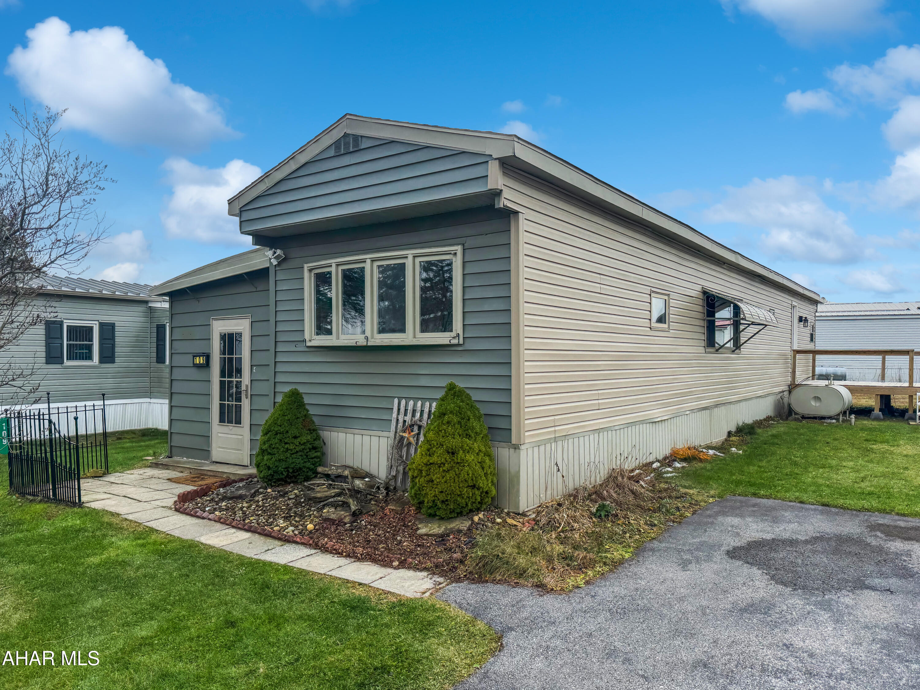 Welcome to 109 Short Drive in the desirable 55+ Wises Trailer Court, an exceptionally well-kept community with a low $250 monthly lot rent that includes water, sewer, and trash. This beautifully updated single-wide home offers a spacious mudroom, an inviting living room, a generous eat-in kitchen, a fully renovated bathroom w/ a tile shower, a convenient laundry room, and a cozy bedroom. Recent improvements include new flooring throughout, fresh paint, and a fully updated bathroom. Outside, enjoy off-street parking and a large porch perfect for relaxing. Call today for more information!