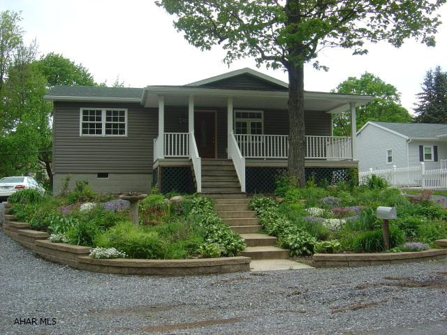 Convenient location in Greenwood, detached 24 x 24 garage/carport, parking for RV/travel trailer, open floor plan, great room, new contruction, 75 x 120 lot, public utilities in Logan Twp., very energy efficient, new stainless steel appliances, washer and dryer, central air, handicap access, wide doorways.