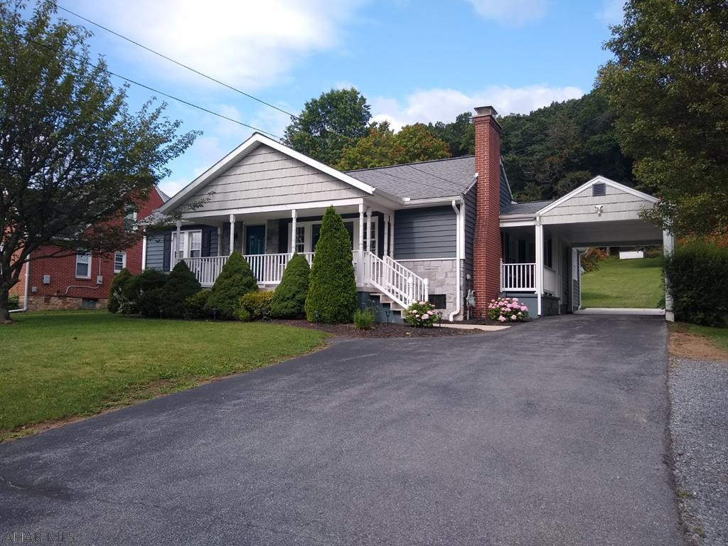 Beautifully updated house located just outside downtown Bedford. Centrally located near I-99, I-76, I-70 and Rt. 30. Previously used as a professional building and with easy access for customers, you could open your own business here. Newer roof, new insulated siding and updated electrical. With original refinished hardwood floors through-out most of the home, a gas fireplace in the living room, spacious patio area and backyard, and an all season's sunroom (which could easily become a master suite), this home is a must see. Call today for your private showing and to see the potential it holds for you!