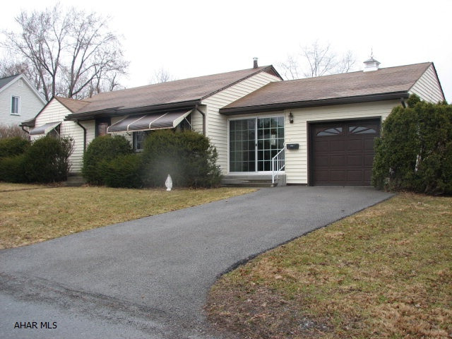 Beautiful ranch home in very popular Highland Park area.  Off street parking with driveway and garage. Breezeway and back patio. Spacious kitchen and dining room.  Big living room with stone mantle place. Bathroom that has been completely updated.  Hardwood flooring in bedrooms.  Huge basement with area way access to back yard.  Elec, furnace and water heater brand new just installed in 2013.  Home sits on 5 lots with panaramic view of the valley!!!   This is absolute MUST for anyone looking for main floor living. Won't last long!