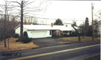 Very attractive rancher in Eldorado.  2 bedrooms, 2 car attached garage, central AC.