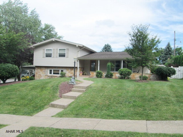 Immaculate multi-level, 3 BR, 2.5 BA home on a corner lot in Highland Park. Gourmet kitchen with granite counters, stainless steel appliances and bright nook area. Main level features vaulted ceilings in LR and Formal DR. Ground level family room shows stone gas log fireplace and leads out to spacious, heated pool with...yes, a hot tub. Lower level features family room, wet bar and office area. Don't miss the heated floor in the master bedroom suite. Don't miss the rare opportunity in Altoona.