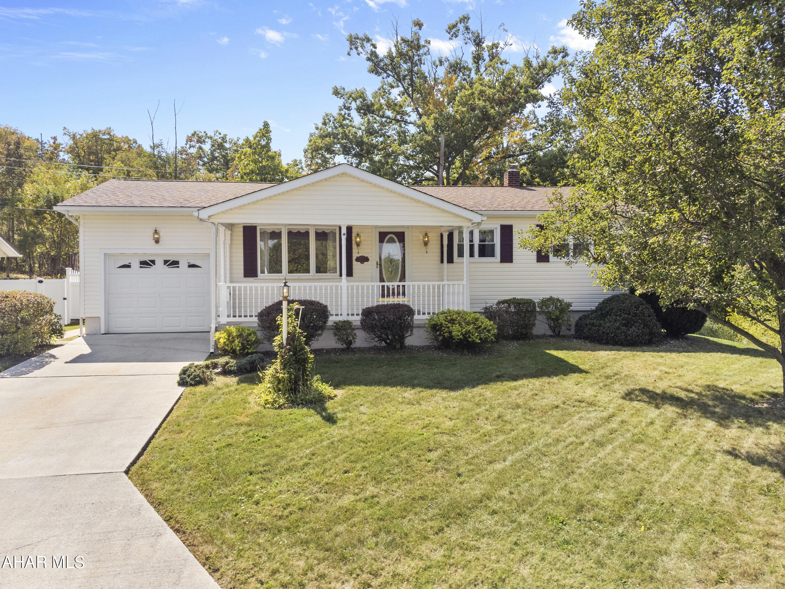 Impeccable 1 story vinyl home in College Heights near Penn State Altoona on 0.4 acre lot. Features large formal living room, eat-in kitchen with adjoining dining area, 3 bedrooms and 1.5 baths. Huge finished basement includes family room w/ bar, wood/coal burner, game room, pool table and large laundry/utility room. Beautiful rear covered deck area with 18' above ground, heated pool and fenced yard. 1 car attached garage w/ openers, new electric heat pump (2023), new roof (2023). Sale includes a total of 4 parcels.