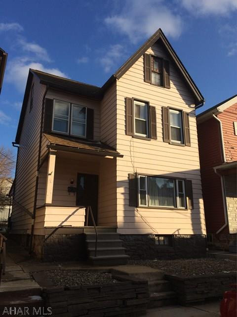 Ready to move in home with good mechanicals. Roof only several years old, replacement windows throughout (except attic). Partially fenced back yard, and covered patio. Private off street parking in the rear, a must in the city.