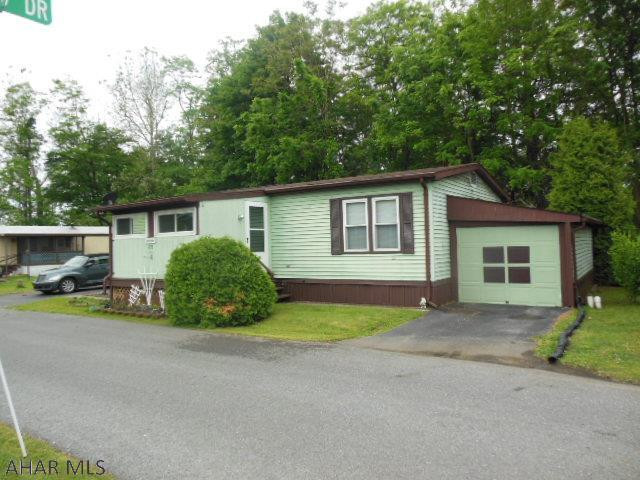 Eldorado Mobile Home Court!  Spacious, double-wide (24' x 40") in Eldorado with appliances, shed, garage and rear private deck. Flowers, vegetables, comfortable sanctuary. Level area for walking, etc. These homes don't last long because they're inexpensive living and close to shopping. This is one of the larger homes. Cash or equivalent. *Enter Court on Brookwood Drive and follow to the right. The rent for that lot is $323  per month.  This includes trash removal,   street snow removal and common area maintenance. In addition to the lot rent, each home owner is billed for their water and sewer usage, which is based on the amount of water they used the past month.    The average water/sewer bill is about $45-55 each month, but the actual amount depends on their usage.