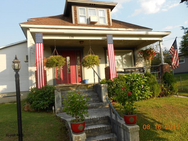 Nice family home on double lot. 2 car garage, shed included.