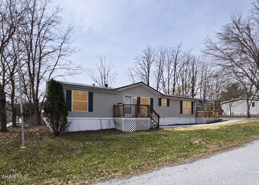 Beautifully updated 1996 Champion 24x52 manufactured home offering stylish, move-in-ready living with extensive renovations already completed. Major improvements include all-new insulation, new subflooring throughout, updated water lines with full plumbing improvements, and a new forced-air electric HVAC system with a high-efficiency heat pump for year-round comfort and energy efficiency. Inside, the home features fresh modern finishes, updated flooring throughout, a bright and spacious open living area, and a beautifully remodeled kitchen with updated cabinetry, countertops, backsplash, and a center island for added workspace and storage. Both bathrooms have been thoughtfully renovated with updated vanities, fixtures, plumbing, and attractive tile finishes, including a spacious primary bath with double vanity and oversized walk-in shower. Additional highlights include recessed lighting, large windows for great natural light, comfortable carpeted bedrooms, and inviting outdoor deck space perfect for relaxing or entertaining. A wonderful opportunity to own a thoroughly improved home with both major mechanical updates and tasteful cosmetic upgrades already in place.

Financing options for manufactured homes on leased lots may be available to qualified buyers. Ask agent for details.