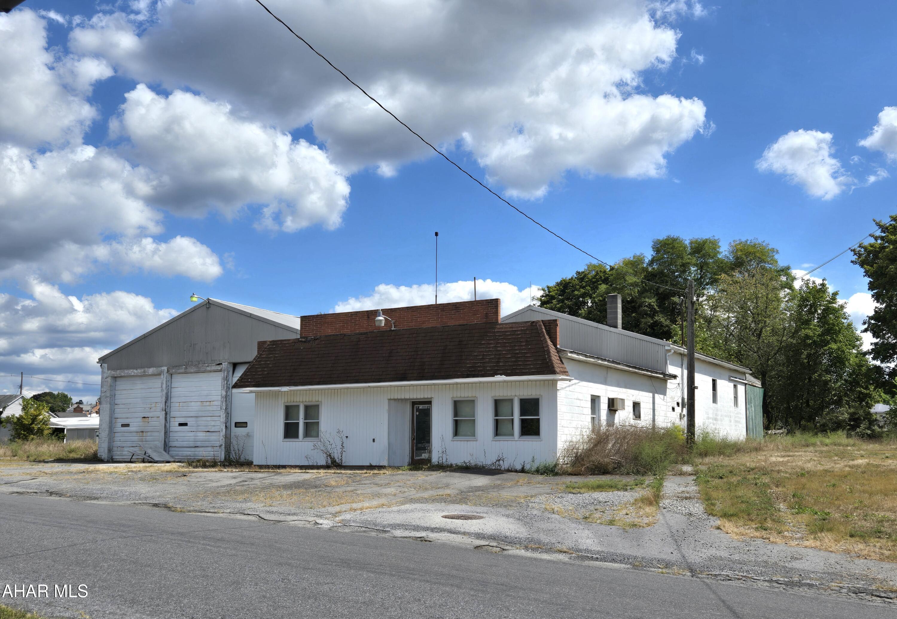 5,744 sq ft storage building with surfaced parking in North Woodbury Twp on .75 Acre lot. Current owner had used building for general storage. J-673