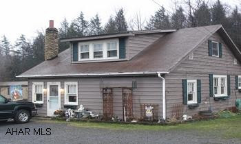 1/2 acre tenant occupied rental home. Large level lot. XL garage/storage bldg. 1/2 acre tenant occupied rental home. Large level lot. XL garage/storage bldg.