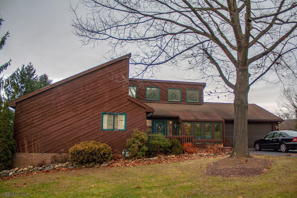 This updated cedar home is a rare find!  Located in the desirable development of Rolling Hills, this one story home has everything you could ask for, even a heated in-ground pool!  The main level has an updated eat-in kitchen, 3 bedrooms (master bedroom has a walk in closet and ensuite bath), one additional full bath, loft above living room, access to rear deck, and formal dining room.  The basement has a wet bar and plenty of space to entertain.  There is a walkout to the pool area and a laundry room as well.  There is a wood burner and wood fireplace in the basement. The home has central air, plenty of storage space throughout, and a 2 bay garage with office built into the one side.