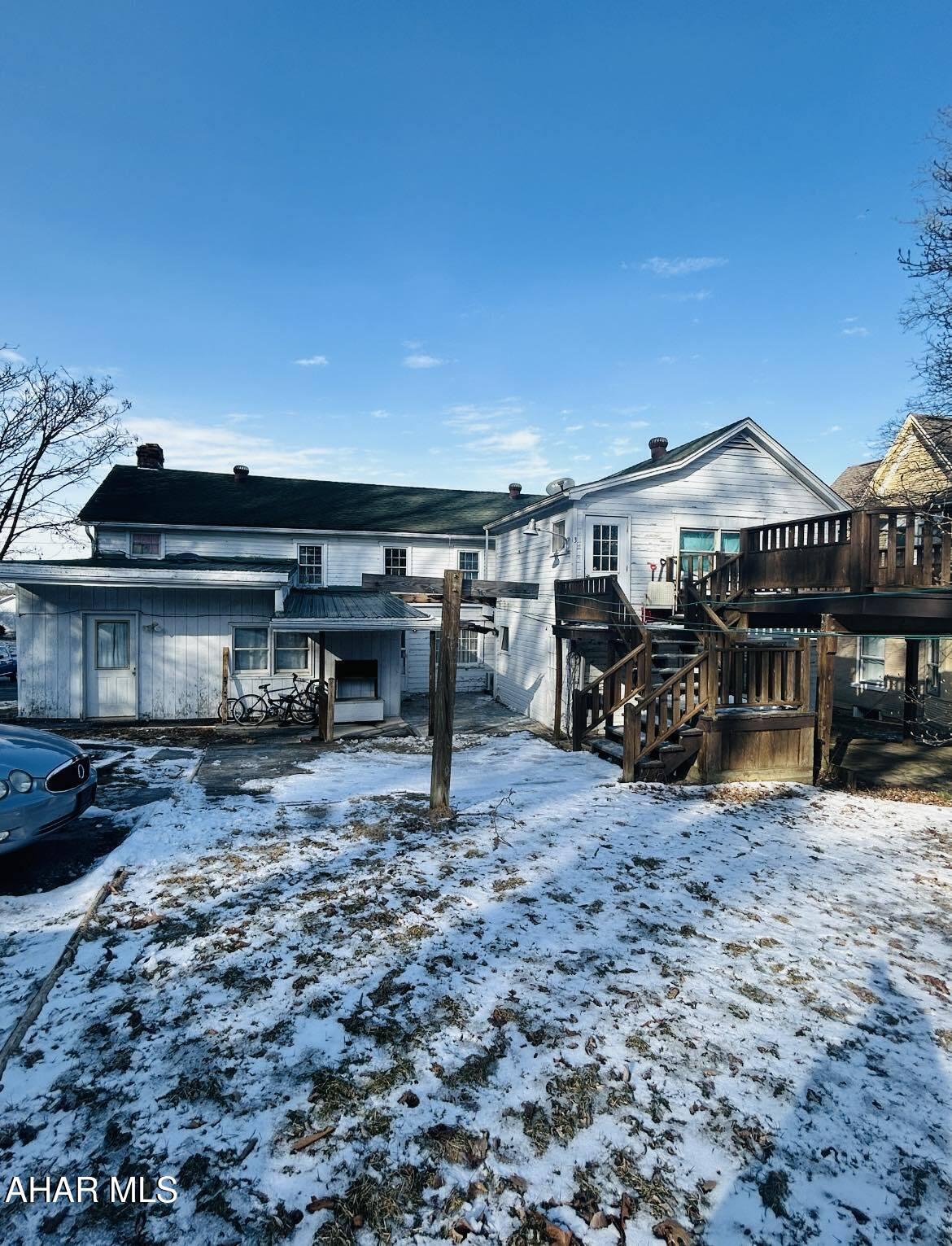 Great  investing  and business opportunity .2 large apartments and one extra unit that is now  rented  but used to be a beauty shop .great locations, quite street and walking distance to downtown Bedford