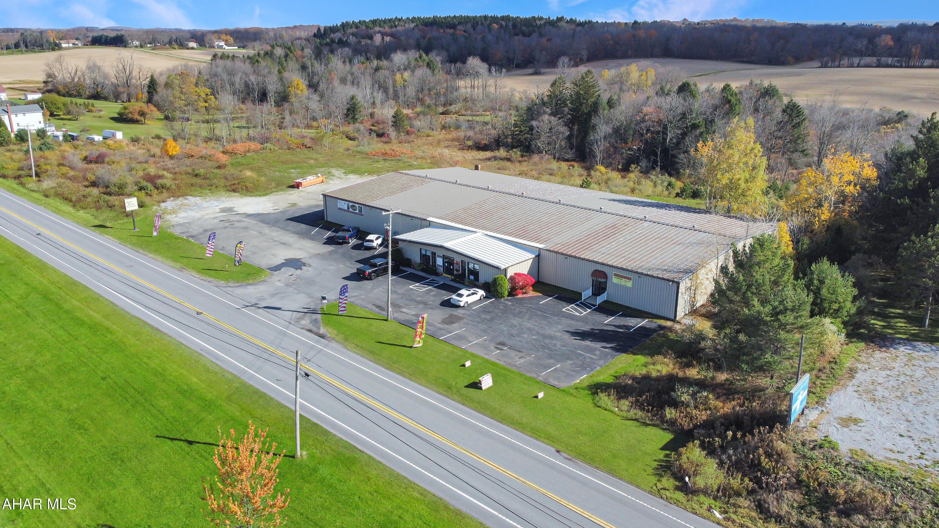 Discover an incredible opportunity to lease approximately 5,000 square feet of versatile space! The landlord is willing to subdivide into smaller units tailored to your needs. This prime location is attached to the thriving Home Design Concepts & situated along N Center Street, conveniently located across from Emerald Estates & just outside the borough of Ebensburg. With a high traffic count & a large space w/ high ceilings, this property is ideal for a wide range of businesses. Whether you're looking for office space, medical, retail, a gymnastics studio, a dance studio, or even industrial & manufacturing setups, this space can accommodate your vision! There is also the potential to expand the exterior of the property for outside storage, etc. as multiple acres are available. Call today for more info!