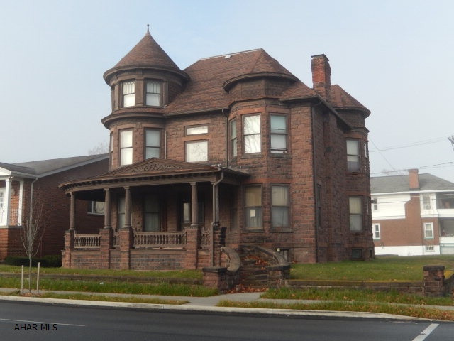 Stone house currently set up as residential duplex but this property offers so many possibilities!  Great commercial/investment opportunity with a little TLC.