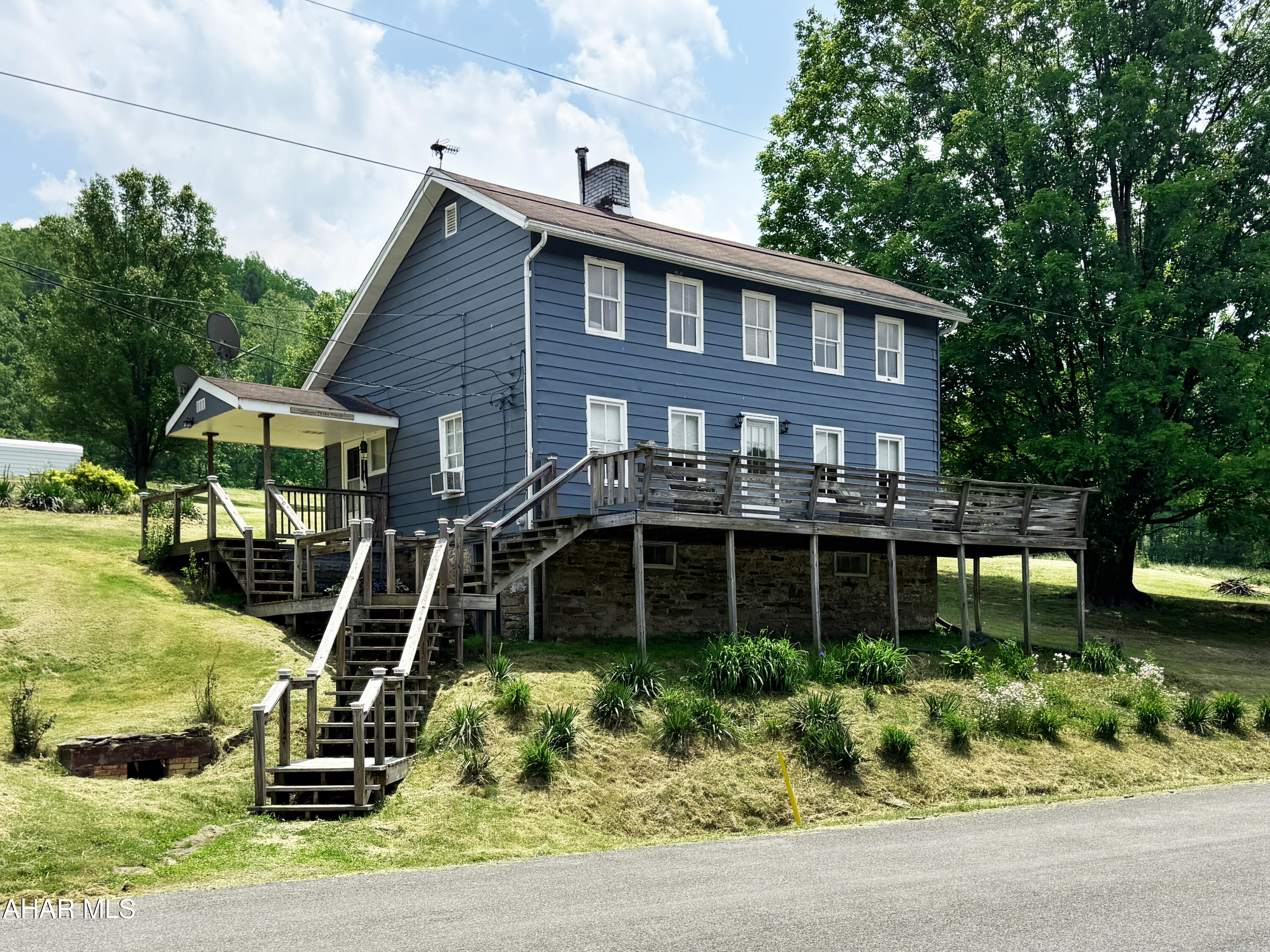 Dreams do come true! If your dreams have consisted of owning a 10 acre farmette nestled in the mountains of PA with outdoor leisure and adventure at your fingertips and tons of space to work, play, and grow, 686 Cherry Run Road in Ford City, PA is your dream come true! And to make your dream just a little sweeter, this awesome property is equipped with free natural gas.

The cozy hillside home is surrounded by streams, fenced-in pastures, animal shelters, cultivated berry patches, apple trees, and nectarine tree. A site has been prepared with water, sewer, and gas for a 30x40 garage, barn, or shed. It provides quick access to a stocked creek and the local Cherry Run Sportsman's Club. It is not uncommon to spot wildlife of all kinds.

This little slice of paradise is within an hour of Indiana, Pittsburgh, and Butler, PA. Cranberry and Punxsutawney are also within proximity. It takes just a quick drive to enjoy quaint country farm and meat markets. It is smack-dab in the middle of outdoor recreation heaven as it is near game lands, waterfalls, and various water trails,  and hiking biking trails such as the Ghost Town Trail and Indiana County Parks and Trails. Kayak, fish, hunt, run, bike, hike, and explore the best attributes of Pennsylvania or live happy staying home on the farm doing what you love best.