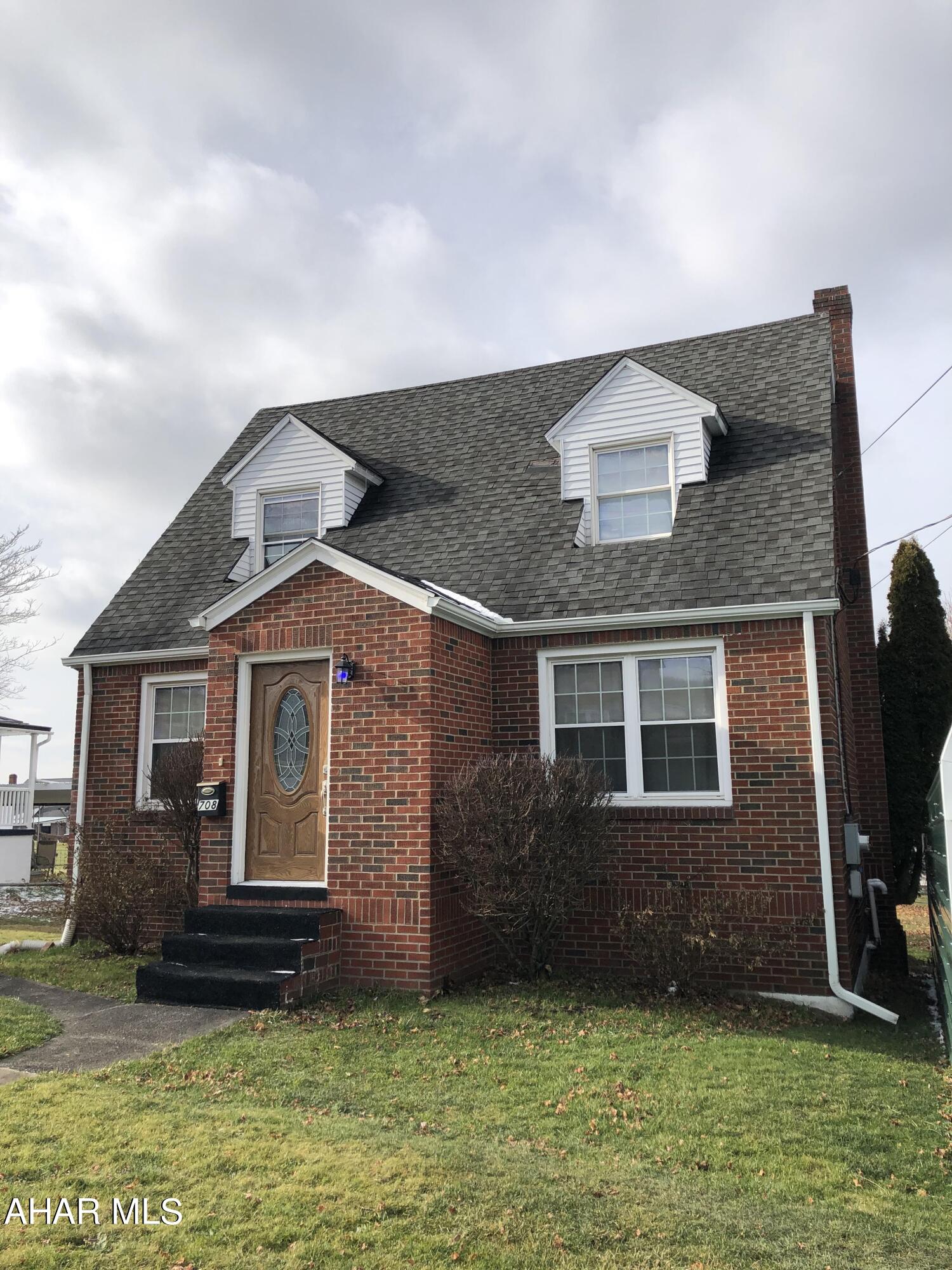 This adorable home with wood floors, large kitchen, first floor bedroom, and full basement with shower and walkout is ready for its new owners. Relax on the rear covered porch and deck area overlooking a low maintenance yard. Rear alleyway access is another added bonus to this property. Don't wait - Schedule your tour!