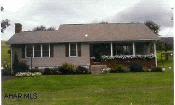 Charming 3 bedroom rancher on 1.7 ac w/mountain view. Home includes a beautiful Early American style family room w/beamed ceilings and grand stone fireplace. It also includes a modern kitchen, formal dining room, large living room and covered porches. Property includes a garden - orchard, shed and picnic pavillion.