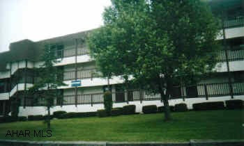 3rd floor 2BR.  Assoc. Dues of $175/mo. includes trash, cable, exterior maintenance, use of pools and tennis courts.