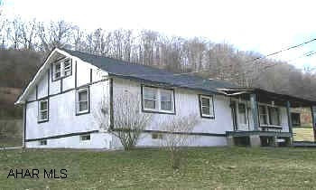 VERY QUIET, PEACEFUL SETTING IN THE MOUNTAINS OF TIPTON. 3.4 ACRES. 1 STORY RANCH HOME WITH A (WORKSHOP). LOTS OF OUTBUIDLINGS. THE PRIVACY YOU'VE BEEN LOOKING FOR.