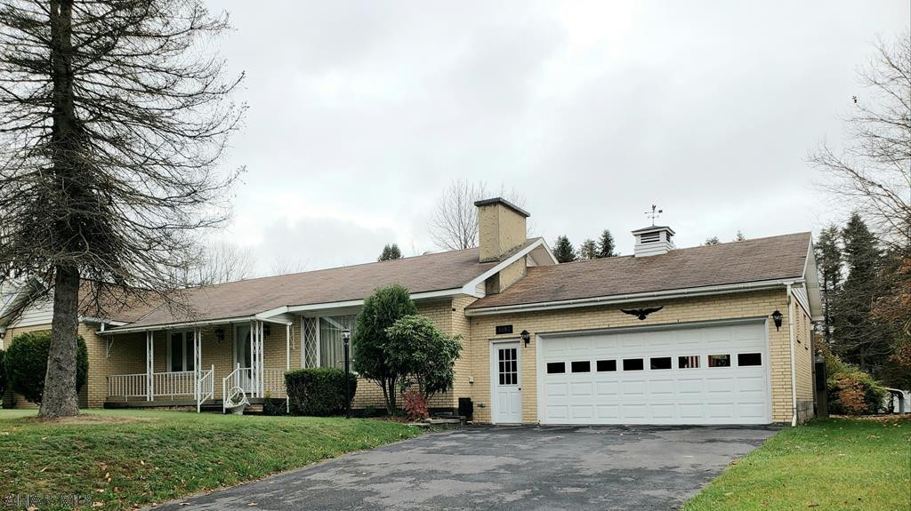 Nice 1-story 3-bedroom 1.5-bath brick home with hardwood flooring, flat yard, attached 2-car garage & blacktop drive. Ideally located 7 miles to Ebensburg & 10 miles to Johnstown. Only 1.9 miles to Rt 22.  J-524
