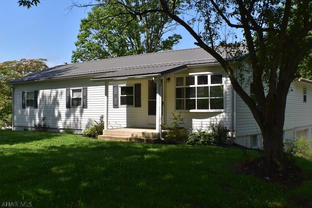This spacious 3 bedroom, 2 bath ranch is just a short drive from historic downtown Bedford and Shawnee State Park.  The open concept is perfect for entertaining.  The small stream running through the backyard creates a relaxing atmosphere for any backyard BBQ!  When the outdoor season is over the newly installed pellet stove will keep you cozy all through the colder months.