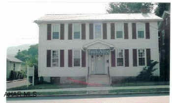 Ttwo-Story residence currently used as a bookstore downstairs and a living area upstairs. There is potential to turn this property into a single family residence with plenty of living area on the 1st floor. Property currently has separate electrical service for each floor, with 100 amp breakers serving each.